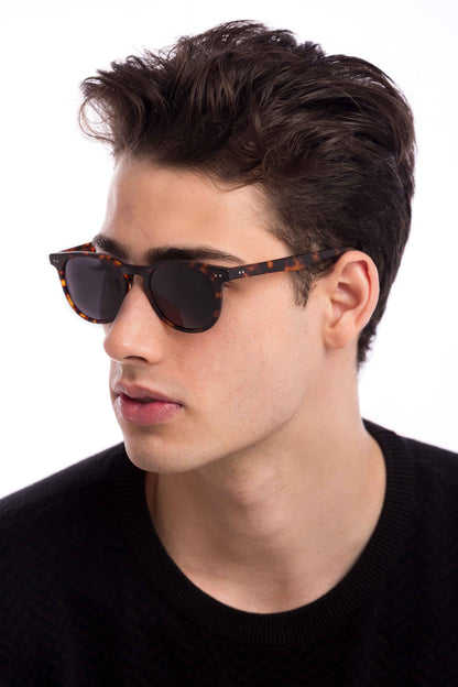 Man Wearing Clarke Sunglasses Prescription (Grey)